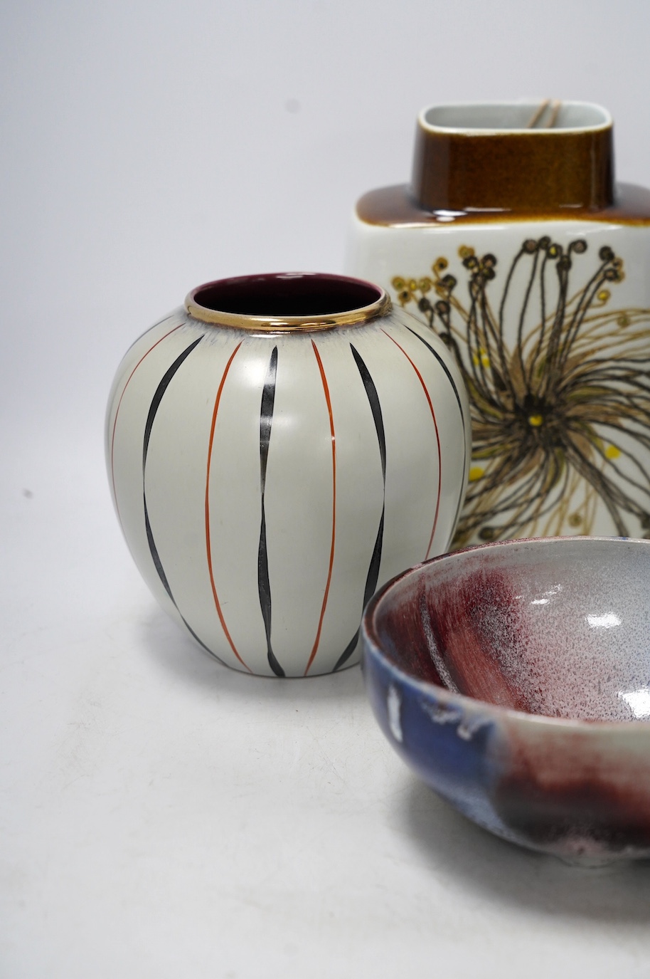 Five ceramic items including a Royal Copenhagen vase, 19cm, two West German vases, tallest 34.5cm, a studio pottery bowl and a Dresden bowl. Condition - good
